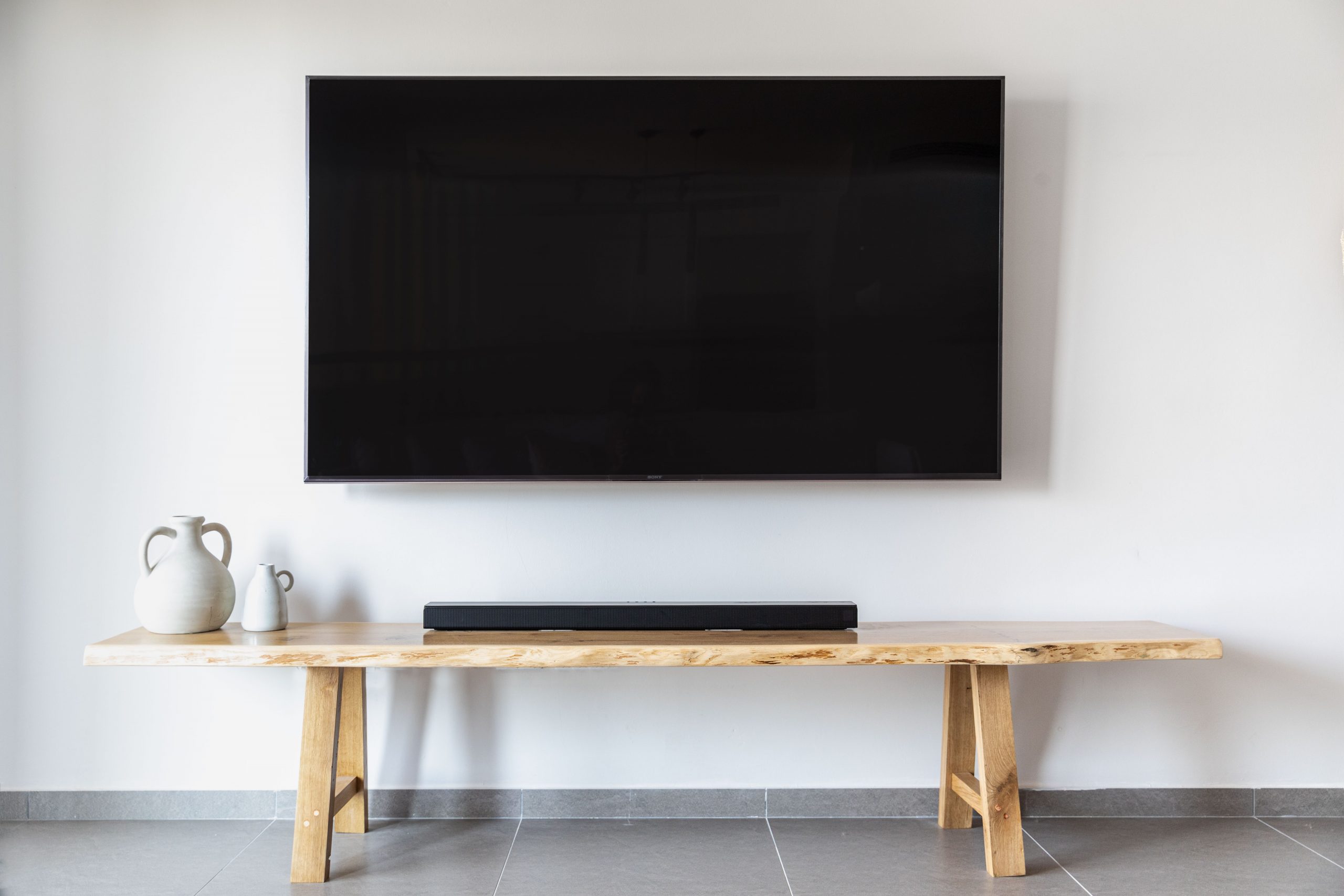 wall mounted tv, sound bar, home audio-visual