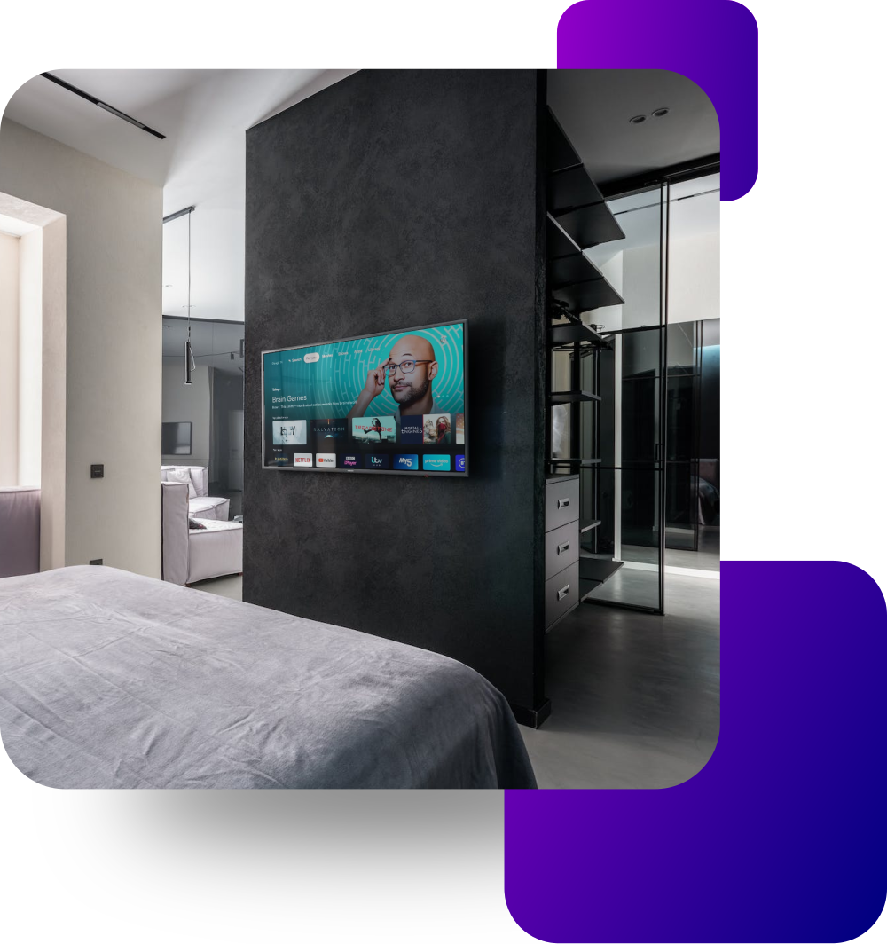 stylised graphic showing a modern bedroom with a tv on the wall